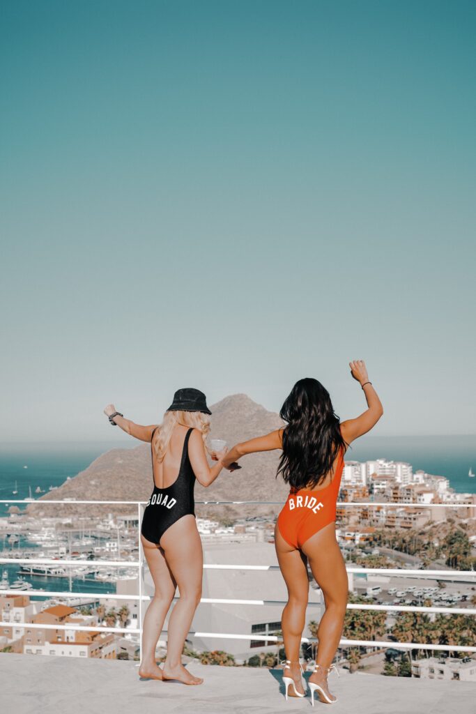 Bride and Bridesmaid celebrating in bikinis